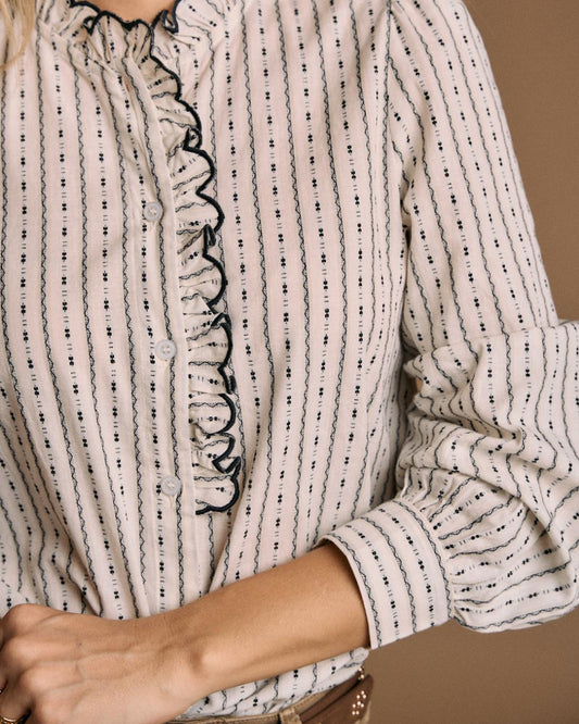 Blusa volante ribete negro